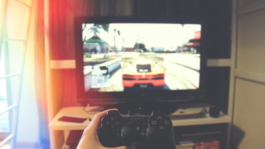 A video gamer plays GTA 5, the precursor to GTA 6 (Grand Theft Auto VI).