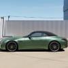A green 2024 Mercedes-AMG SL 63 S E Performance shows off its side profile.