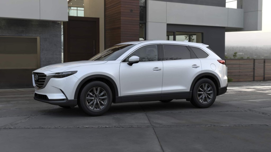 The 2023 Mazda CX-9 parked by a home