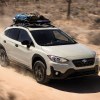 2023 Subaru Crosstrek on a Dirt Trail. For 2024, the Subaur Crosstrek Hybrid is discontinued.