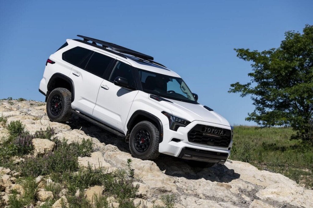 The 2023 Toyota Sequoia off-roading over rocks