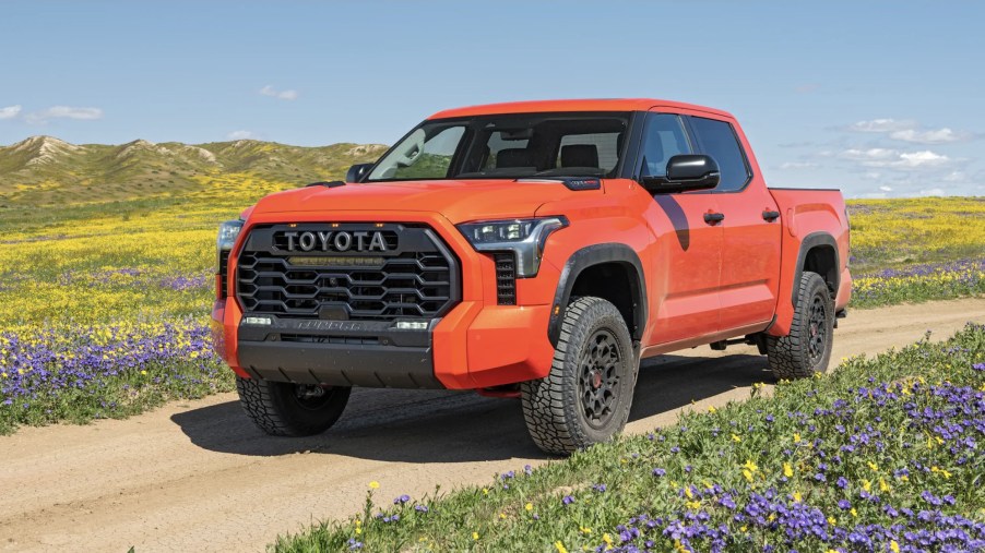 The 2023 Toyota Tundra off-roading in dirt
