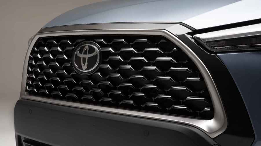 The grille and Toyota emblem of a 2023 Toyota Corolla Cross
