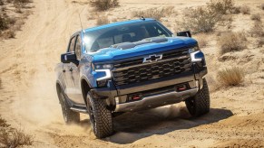 The 2024 Chevy Silverado 1500 ZR2 off-roading in the dirt