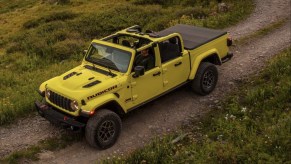 The 2024 Jeep Gladiator off-roading in mud