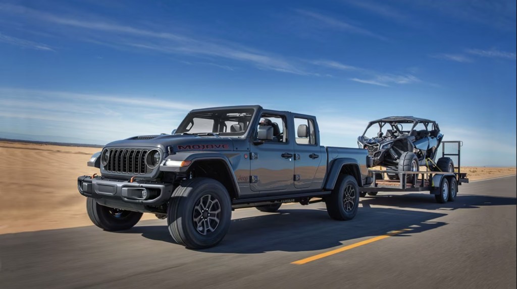 The 2024 Jeep Gladiator on the road, towing a trailer