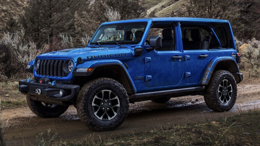 The 2024 Jeep Wrangler off-roading in mud