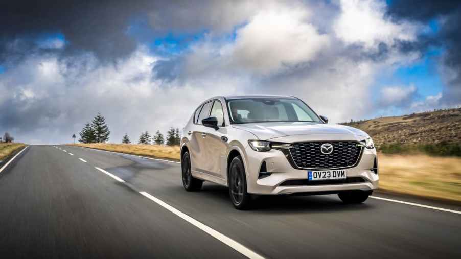The 2024 Mazda CX-60 driving on the road