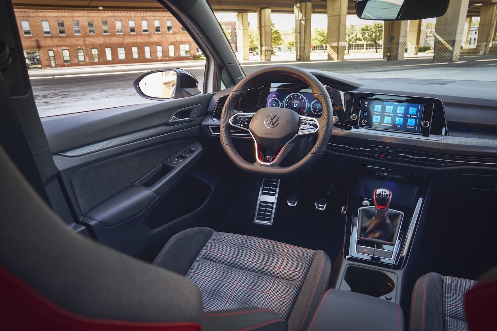 Plaid interior of the Volkswagen Golf GTI sports car.