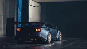 A 2025 Ford Mustang GTD sits in the dark.