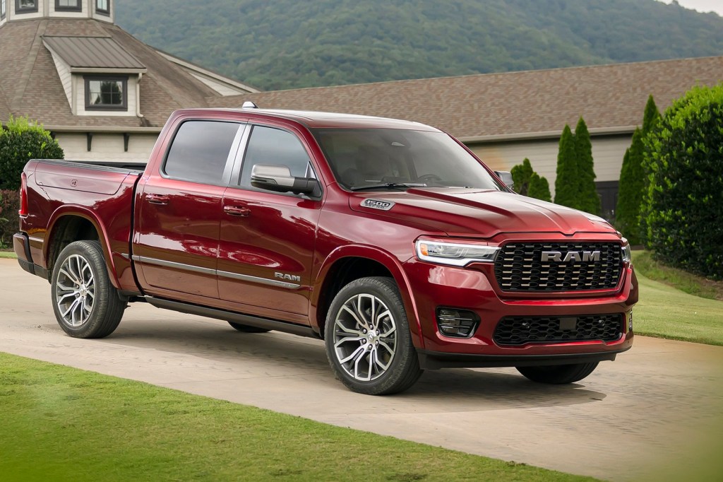 The 2025 Ram 1500 parked near a home