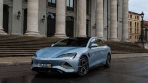 A silver blue BYD Seal, a natural competitor for the Tesla Model 3, shows off its front-end styling in Hungary.