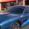 A Detroit Lions-themed Dodge Challenger R/T Scat Pack shows off its livery.