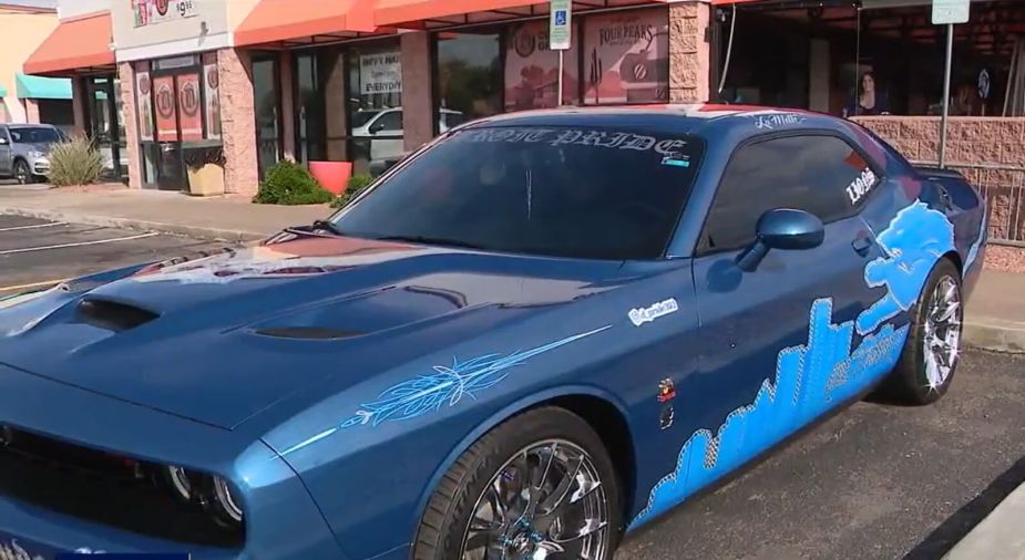A Detroit Lions-themed Dodge Challenger R/T Scat Pack shows off its livery.