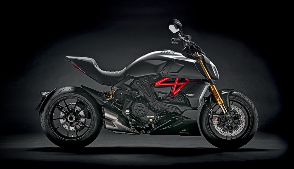 A black Ducati Diavel 1260 S shows off its side profile. 