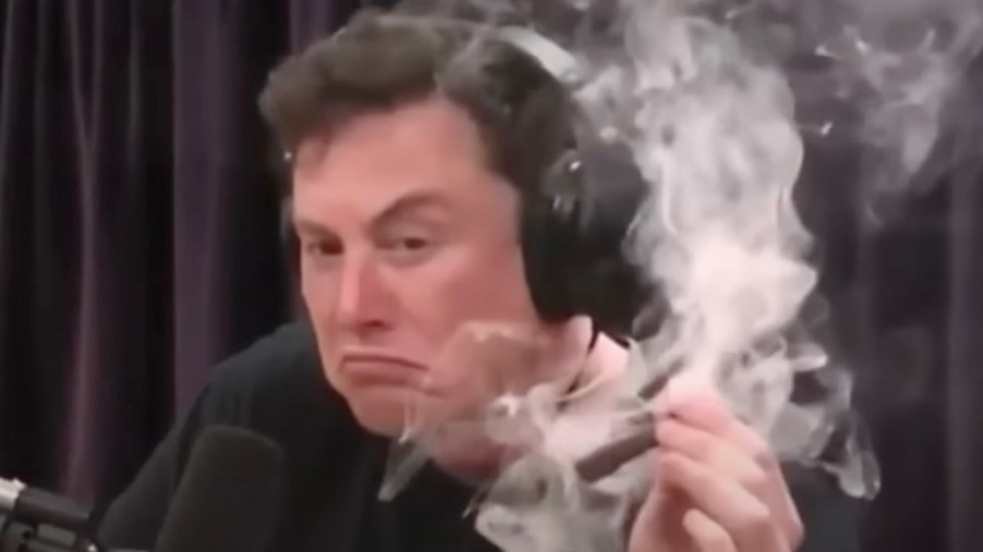 Tesla CEO Elon Musk smokes weed during a Joe Rogan podcast.