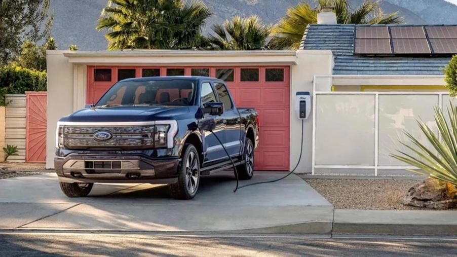 Ford F-150 Lightning Plugged Into the Ford Charge Station Pro , this system can provide power to a home during a power outage.