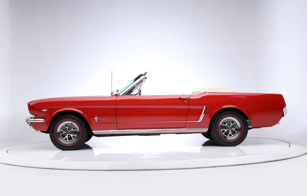 A classic 1965 Ford Mustang shows off its side profile. 