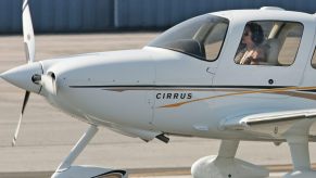 Angelina Jolie, a famous star and celebrity pilot, takes off in a Cirrus airplane.