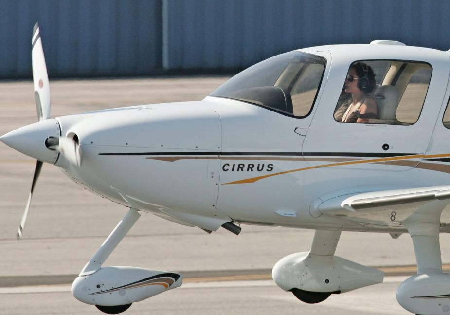 Angelina Jolie, a famous star and celebrity pilot, takes off in a Cirrus airplane.