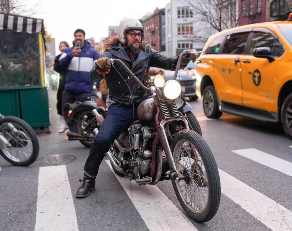 Jason Momoa rides a chopper motorcycle in New York City. 