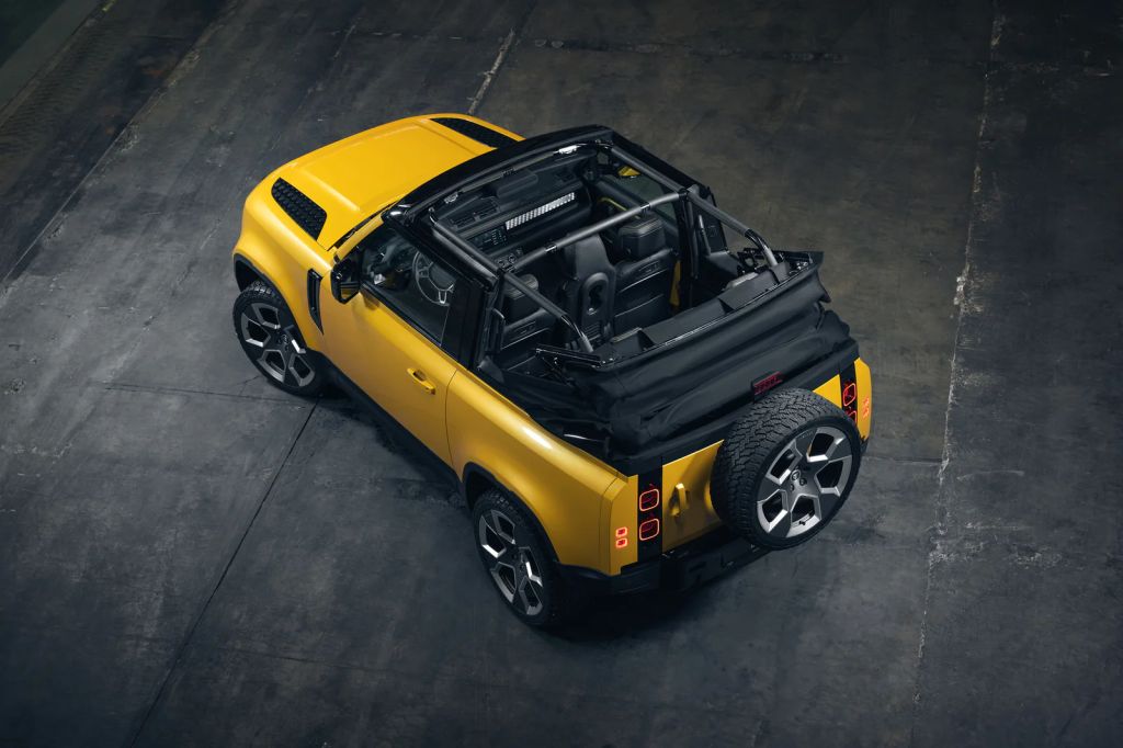 Overhead view of a bright yellow Land Rover convertible custom.