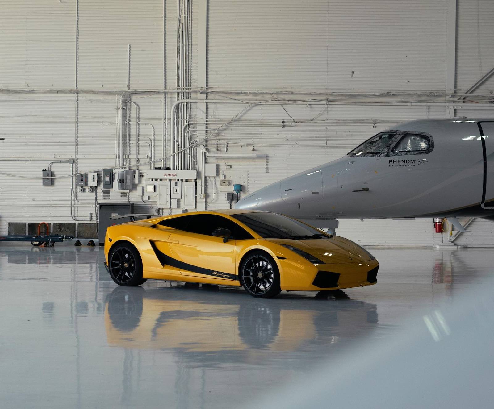Yellow Gallardo special edition in a hanger.