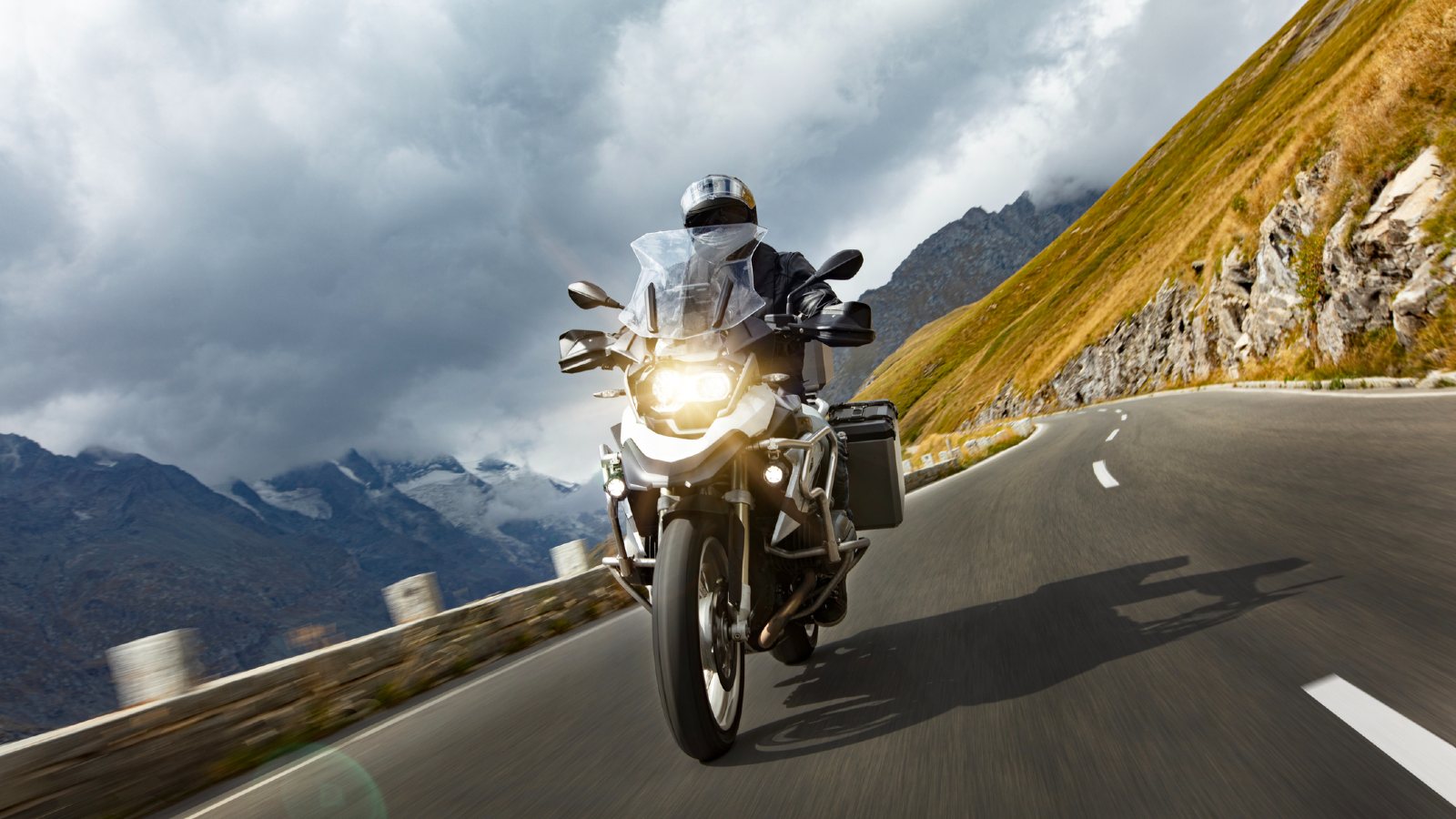 Motorcycle Rider on a Road. This motorcyle will need to be winterized for storage during colder months.