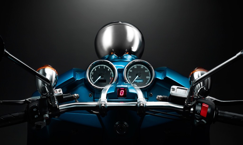The speedometer and light pod of a J Series Super Scooter by Piper Motors