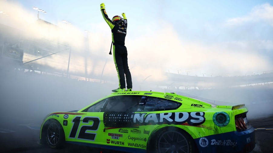 Ryan Blaney celebrates winning the 2023 NASCAR Cup Series championship at Phoenix.