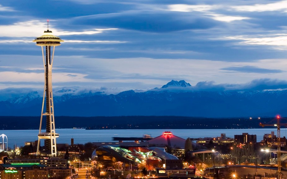 The Seattle skyline, mountains visible in the background. 