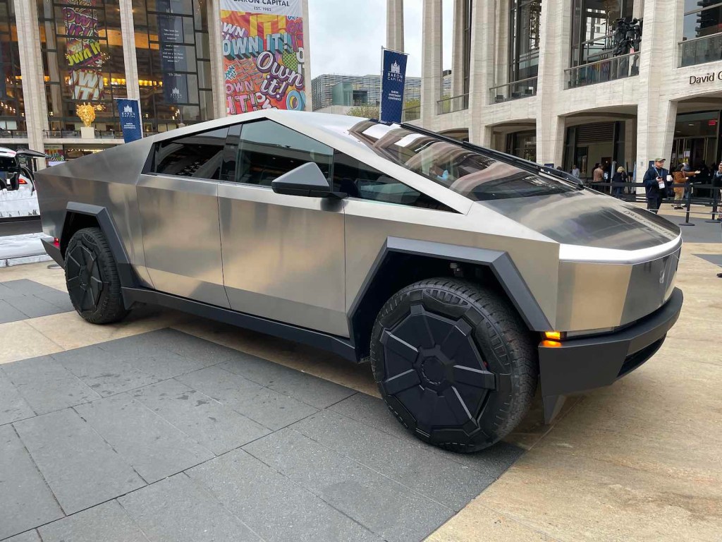 Tesla's new electric Cybertruck EV parked in a plaza