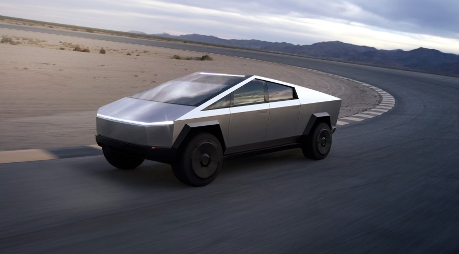 The Tesla Cybertruck driving around a track