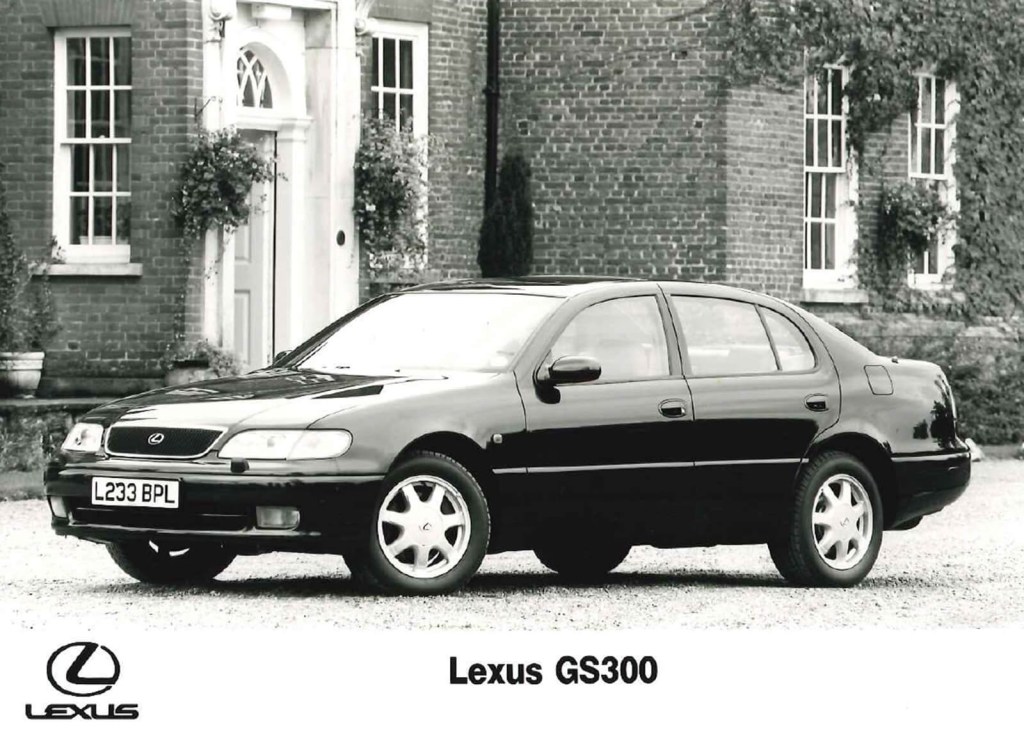 A black and white photo of a 1993 to 1997 Lexus GS300 luxury sedan.