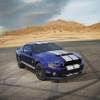 A blue Ford Mustang Shelby GT500 shows off its stripes.