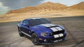 A blue Ford Mustang Shelby GT500 shows off its stripes.