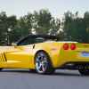 A yellow 2012 Chevrolet Corvette convertible is shown parked at left rear angle part of free fuel leak repair bulletin