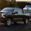 2024 Chevrolet Silverado HD Towing a boat. This truck could have a larger Duramax diesel engine in the future.