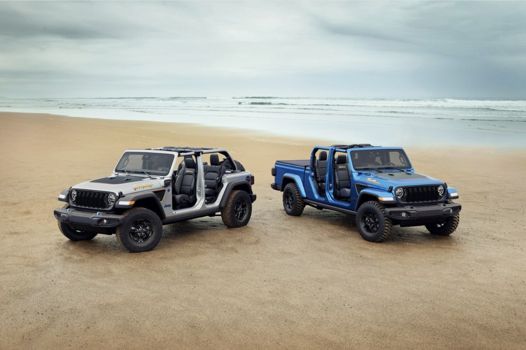 2024 Jeep Gladiator and Jeep Wrangler Jeep Beach Edition Models parked in the sand