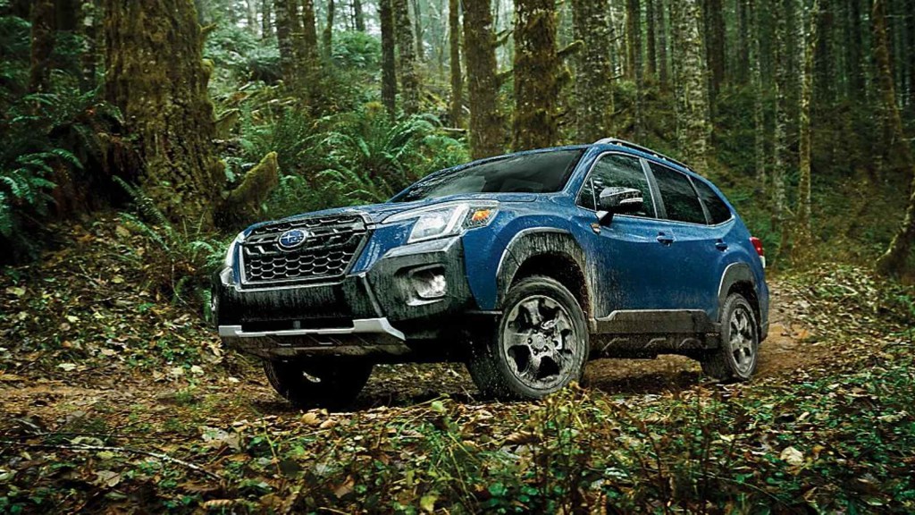 2024 Subaru Forester compact SUV in the wilderness.