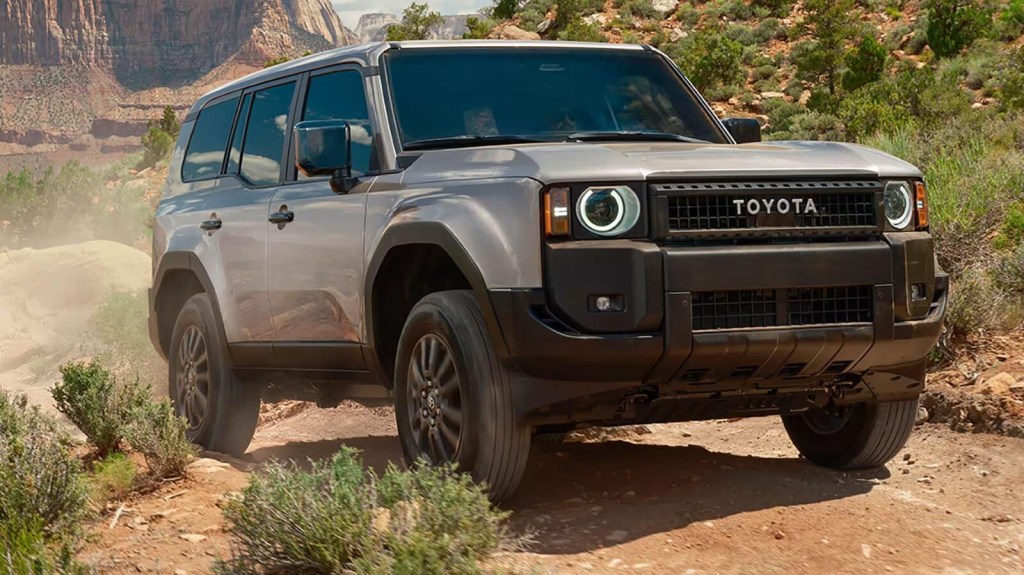The 2024 Toyota Land Cruiser driving through the desert