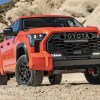 The 2024 Toyota Tundra TRD Pro off-roading in sand