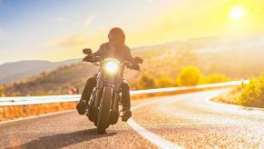 A Harley-Davidson rider adopts good motorcycle safety habits with full kit.