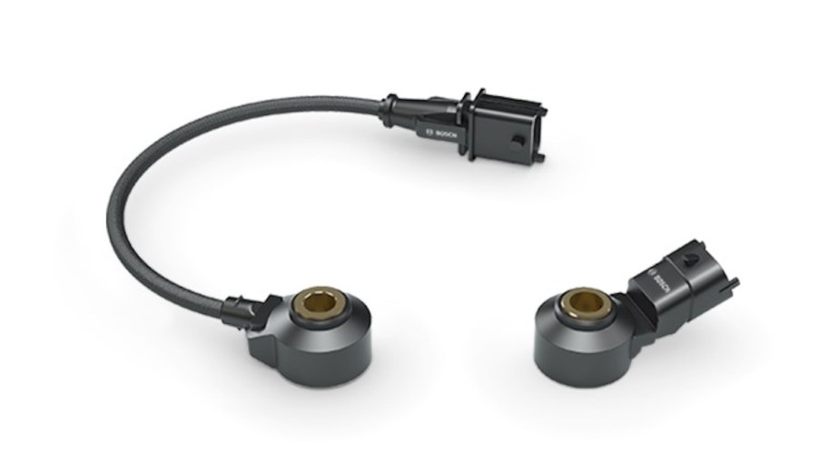 A knock sensor and a knock sensor with an attached cable.