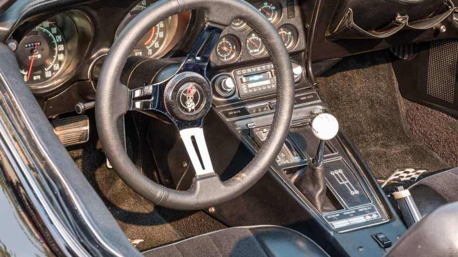 A C3 Corvette shows off its manual transmission.