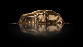 Luxury car wrapped in gold cover.