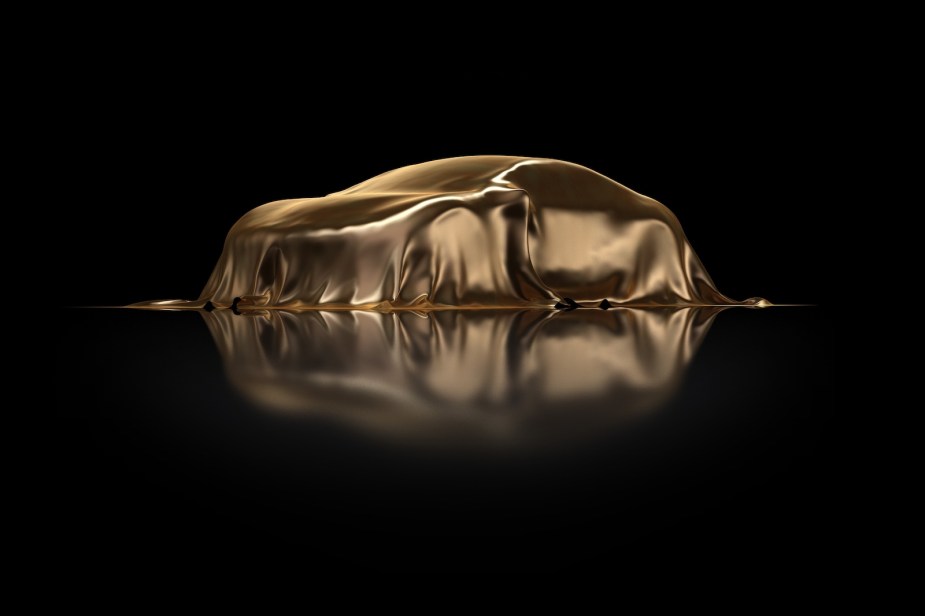 Luxury car wrapped in gold cover.