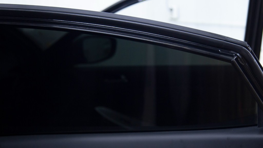 A tinted car window 