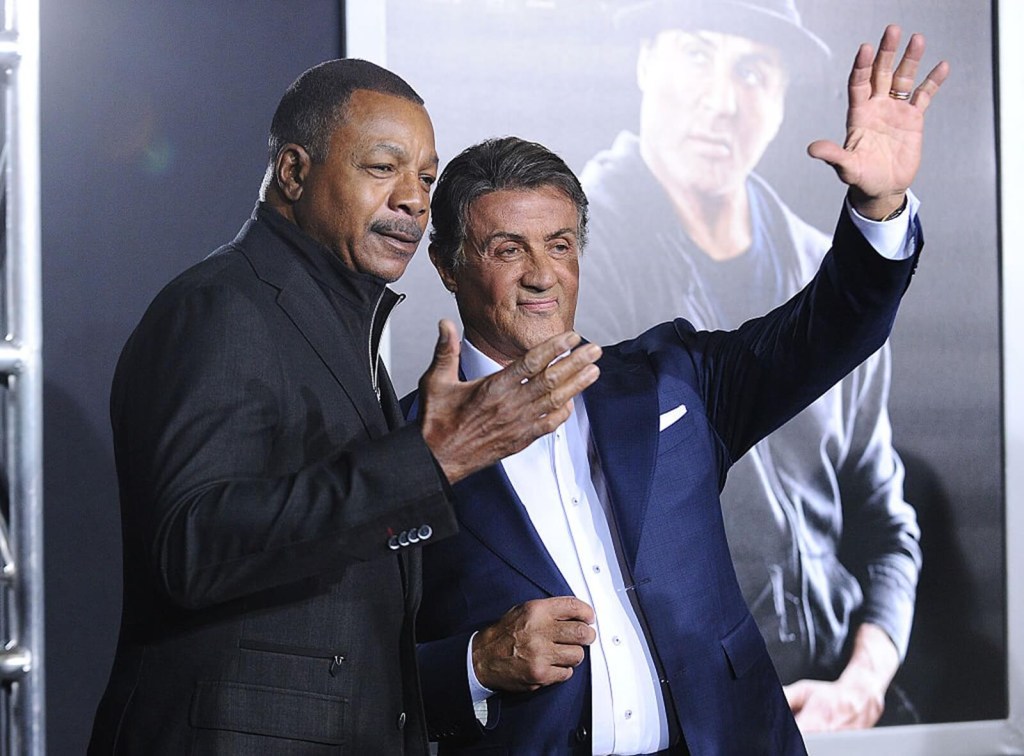 Carl Weathers poses with Sylvester Stallone ahead of his homage in the "Cars" movie. 