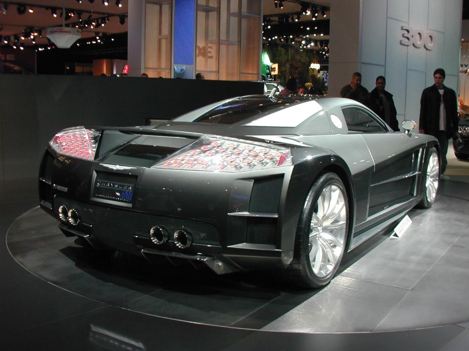Gray, mid-engine Chrysler supercar parked on a car show stage.